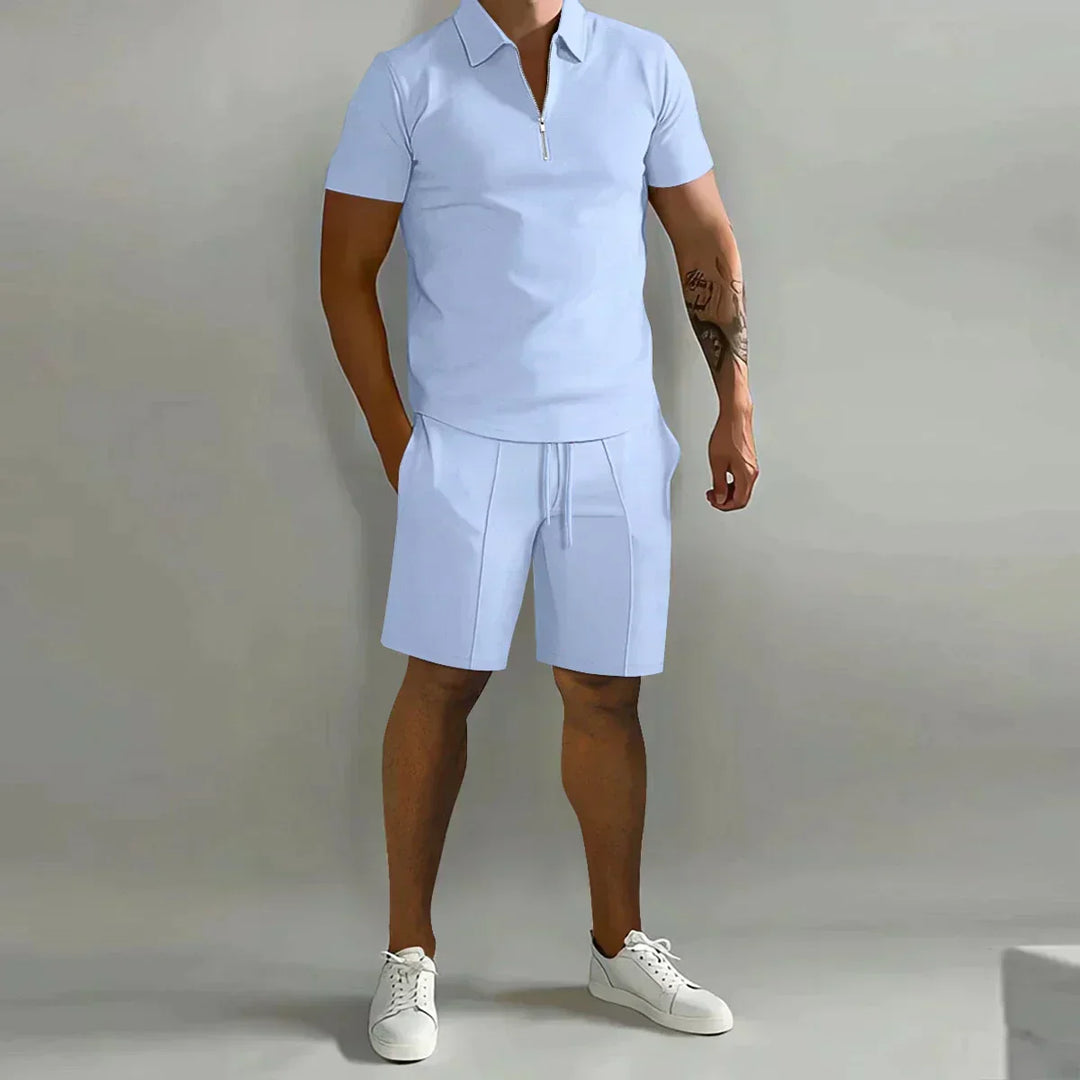 Stylish men's casual outfit: ribbed zip polo shirt & matching drawstring shorts. Perfect for summer fashion.