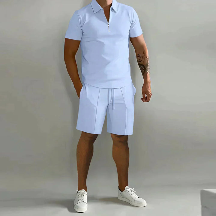 Stylish men's casual outfit: ribbed zip polo shirt & matching drawstring shorts. Perfect for summer fashion.