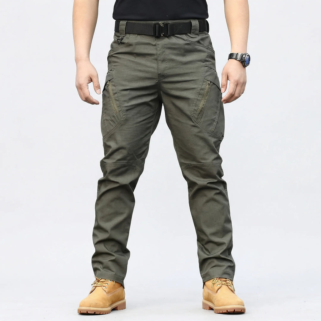 Versatile men's tactical adventure pants. Multi-pocket cargo design, durable for hiking, camping & travel.