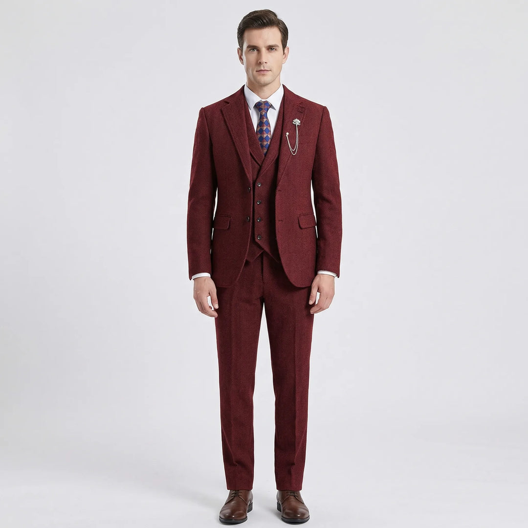Detailed view of the intricate herringbone pattern on men's tailored fit suit fabric, highlighting quality & style.