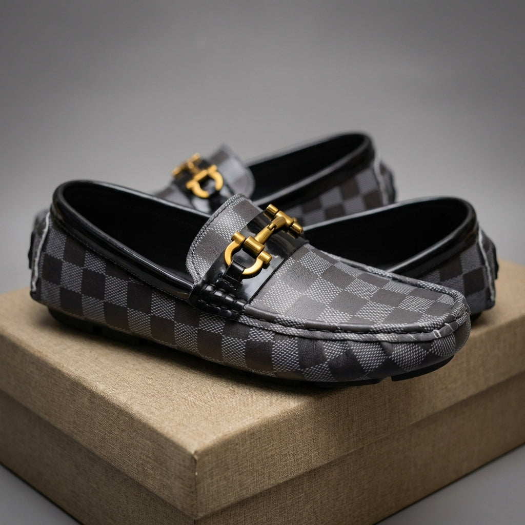Close-up of men's Trapani patterned loafers, showing intricate design & cushioned support for comfort.