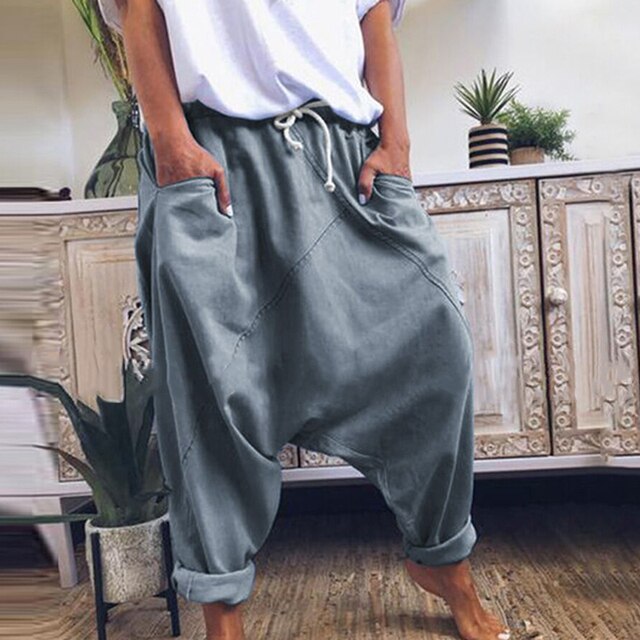 Comfortable men's bohemian harem pants with a loose, wide-leg fit, ideal for relaxed casual wear.