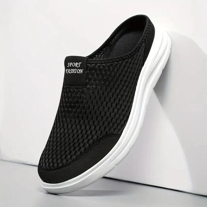 Breathable men's slip-on sandals with balanced arch support, ideal for lightweight travel and all-day comfort footwear.