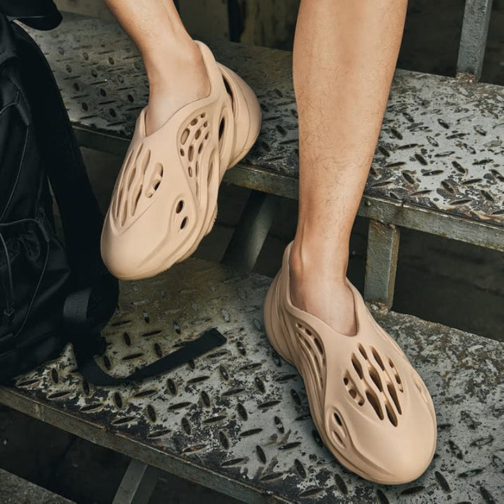 Breathable men's summer footwear. Ultra-light slip-on shoes offering comfort and style for warm weather fashion.