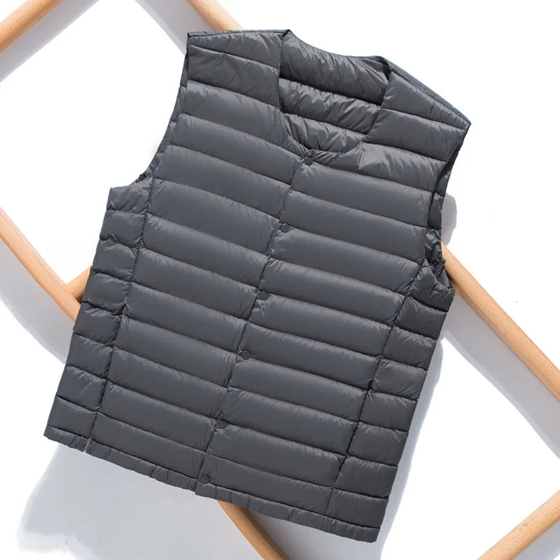 Durable men's ultralight gilet, offering insulation and comfort for multi-season wear. Casual padded outerwear.