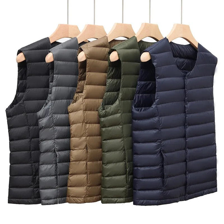 Stylish men's ultralight gilet, a modern layering piece for spring and fall casual outfits. Sleeveless jacket.
