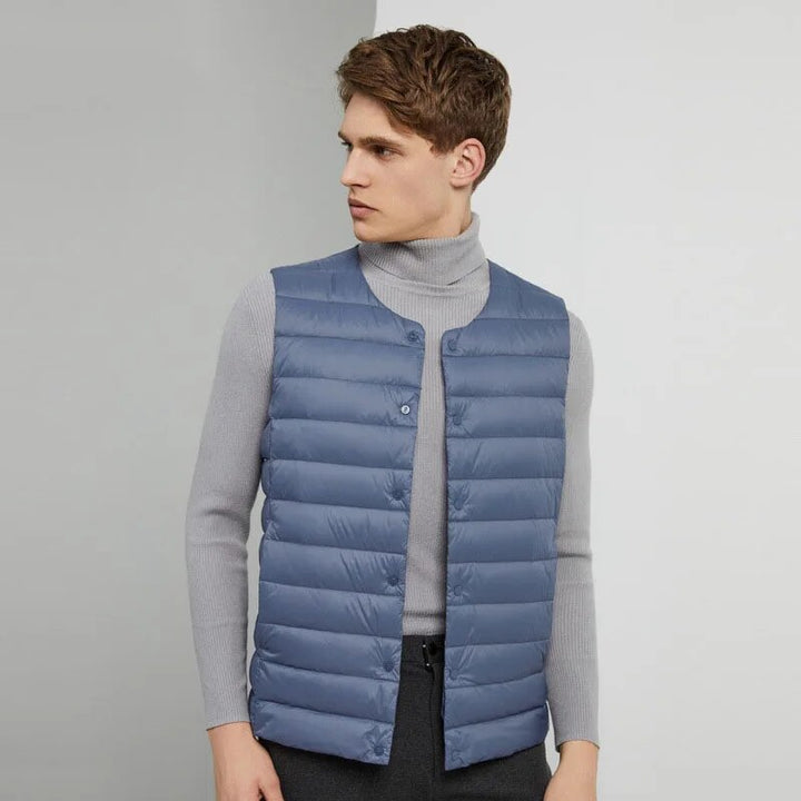 Versatile men's ultralight gilet, essential casual outerwear for transitional spring and fall days. Padded.