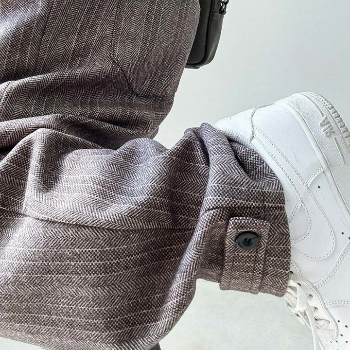 Full shot of men's Urban Drift Pants. Versatile casual wear with relaxed fit, perfect for modern streetwear look.
