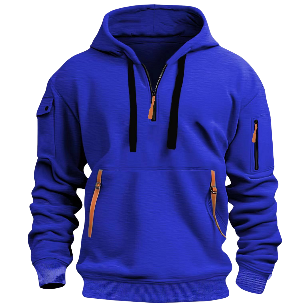 Side profile of a man wearing a brown utility pocket long sleeve hoodie, highlighting the casual style