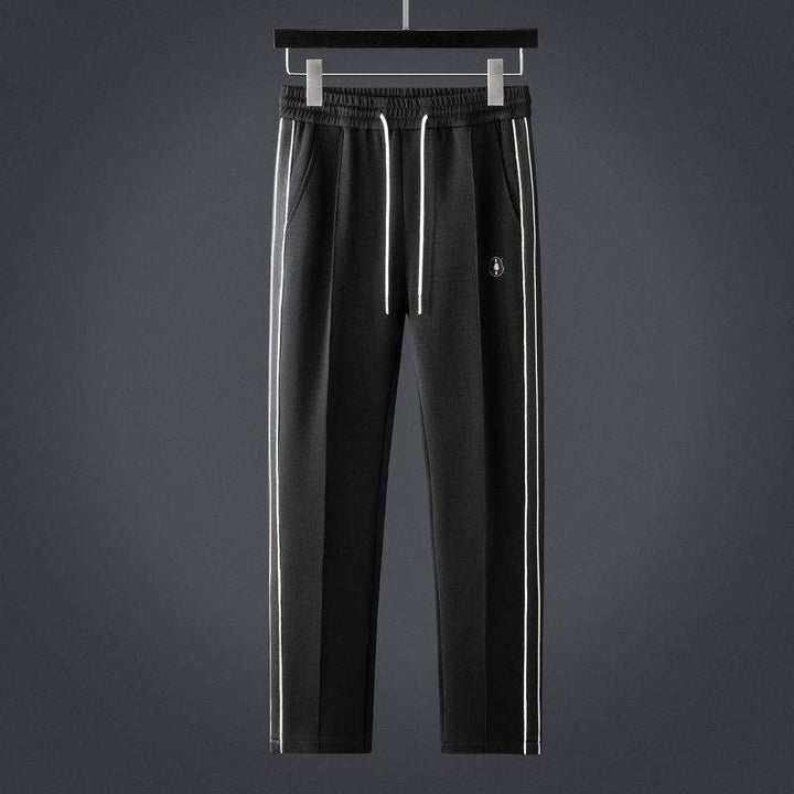 Men's Velocity two-piece tracksuit set, perfect for athletic activities & premium activewear.