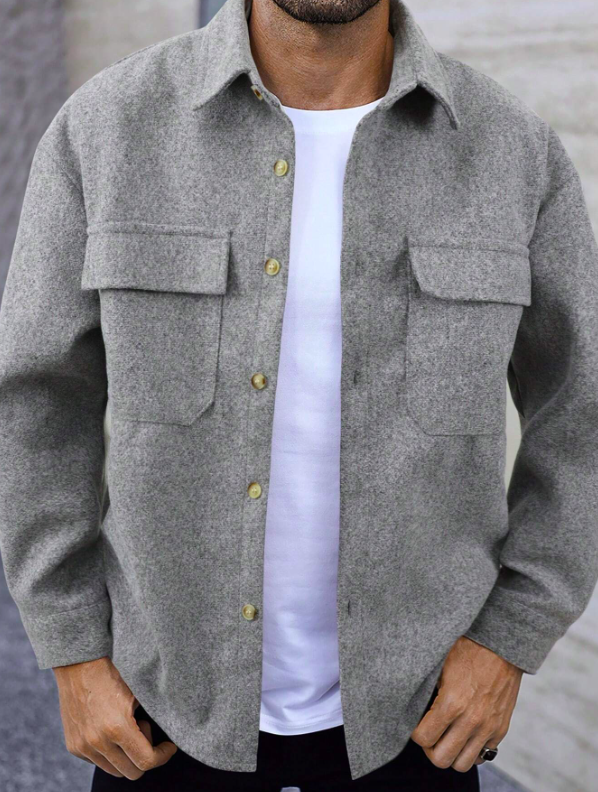 Comfortable men's autumn outerwear jacket, ideal for layering. Features classic button closure and stylish chest pockets.