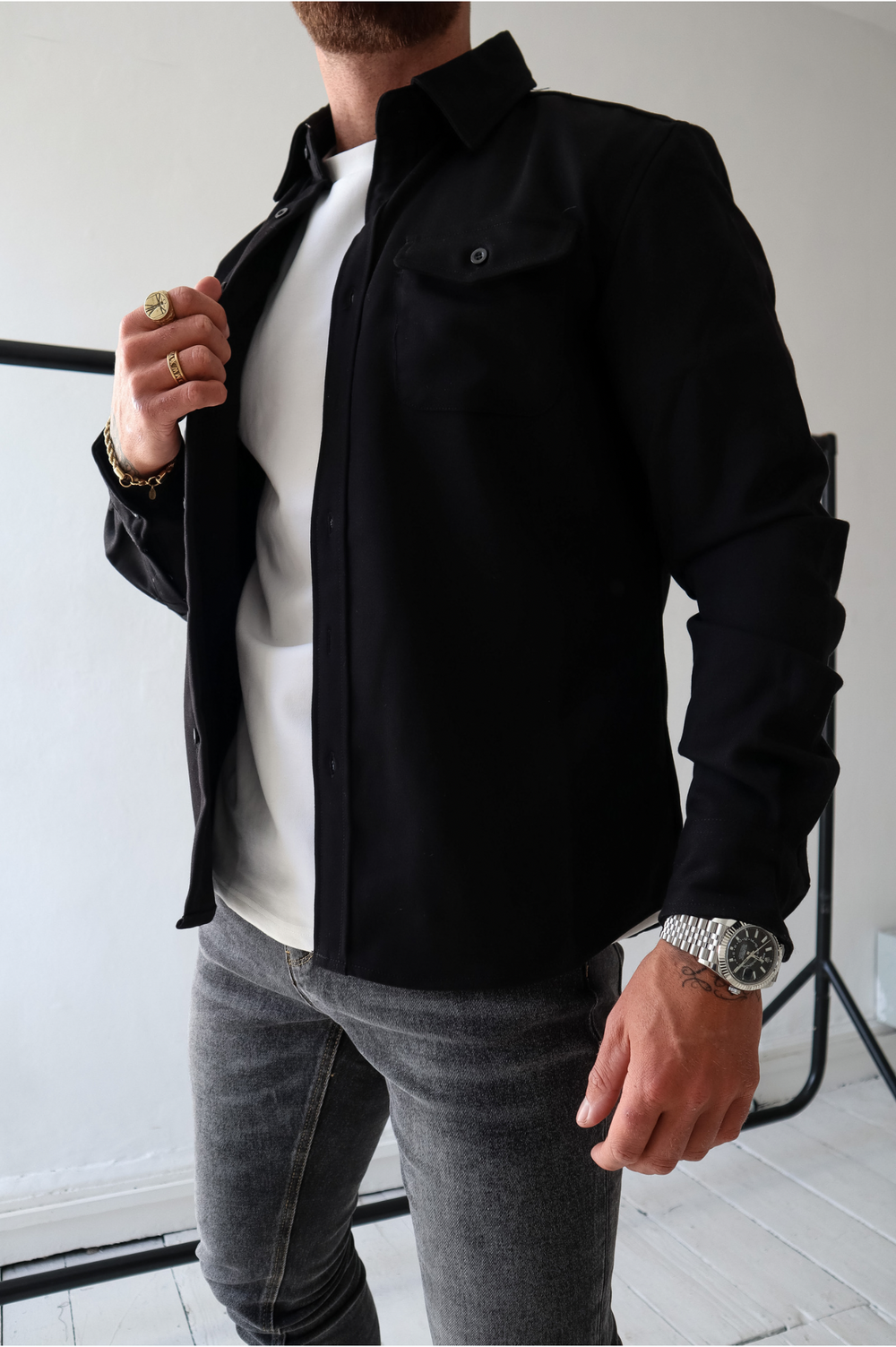 Long sleeve men's overshirt jacket featuring practical chest pockets and button-up front.