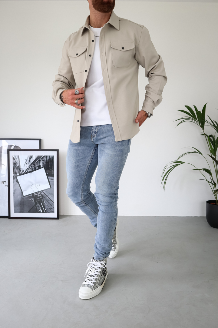 Modern men's fashion button-up overshirt jacket, a regular fit layering piece.