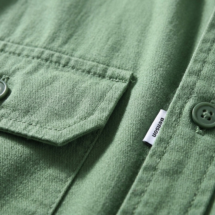 Stylish men's versatile button-up overshirt, perfect for casual layering. Features long sleeves, tailored fit & chest pockets.