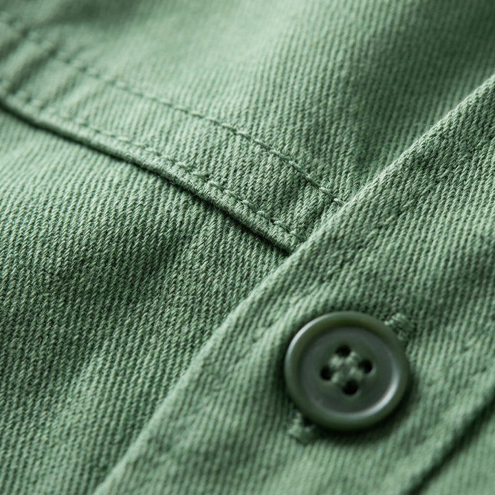 Green men's versatile overshirt, a stylish long sleeve top for casual or smart casual layering.