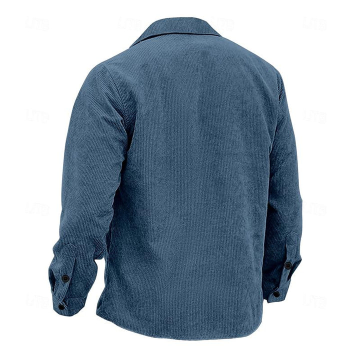 Close-up of men's vintage Henri jacket showing quality fabric & classic button-up front detail.