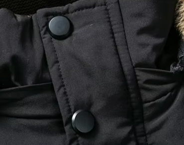 Interior view of a heavy-duty men's parka, highlighting the quilted warmth