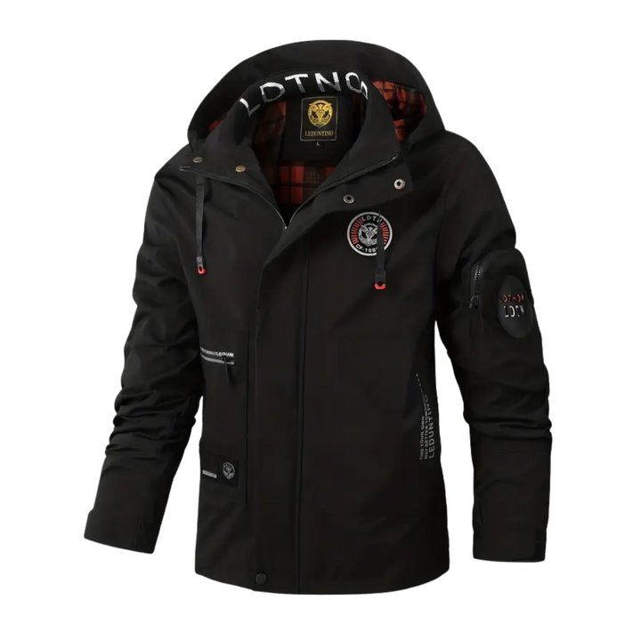 Man hiking in a robust men's waterproof & windproof outdoor jacket with hood, perfect for trails.