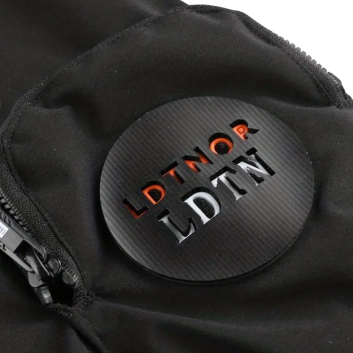 Close-up of a men's waterproof hooded jacket, showing durable fabric and functional zipper details.