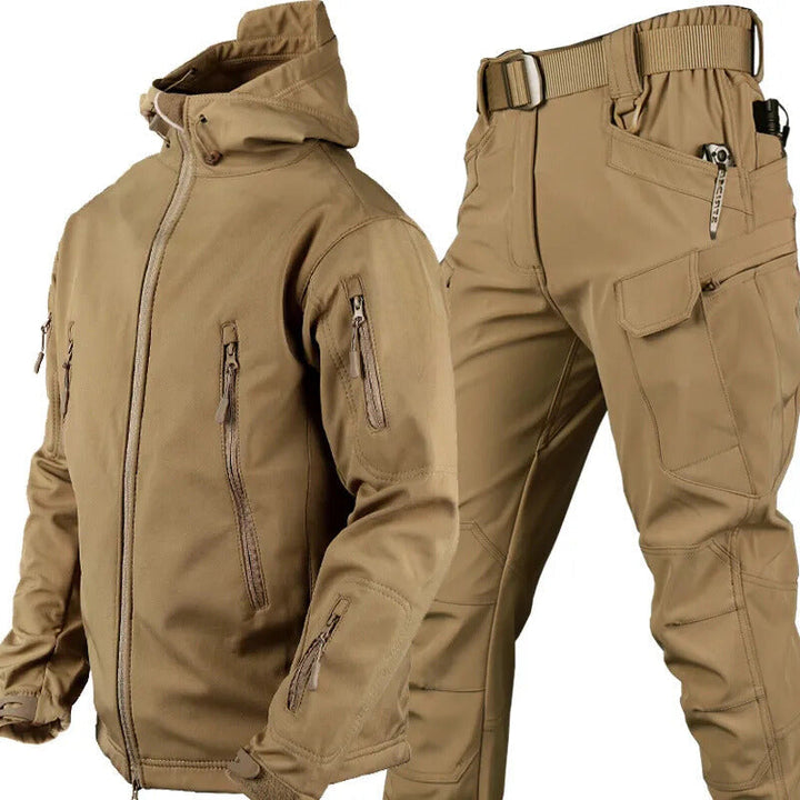 Men's performance outdoor set: waterproof softshell jacket & tactical pants, essential adventure gear.