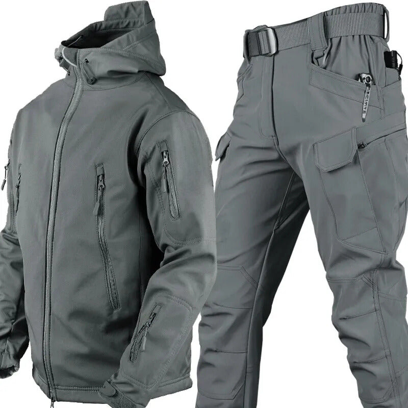 Men's rugged waterproof softshell jacket & tactical pants set, built for demanding outdoor use.