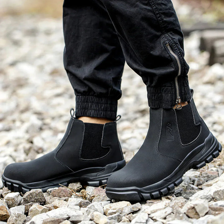 Comfortable men's wide fit safety work boots, waterproof & steel-toed, ideal for long hours in demanding jobs.