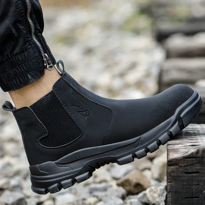 Protective men's waterproof steel toe work boots with a wide fit, designed for tough outdoor and industrial jobs.