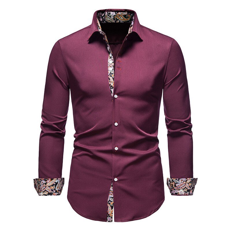 Close-up of a man's white dress shirt, highlighting the stylish floral patterned cuff lining.
