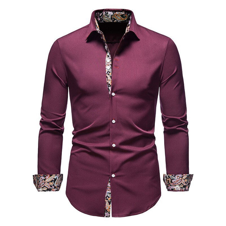 Close-up of a man's white dress shirt, highlighting the stylish floral patterned cuff lining.