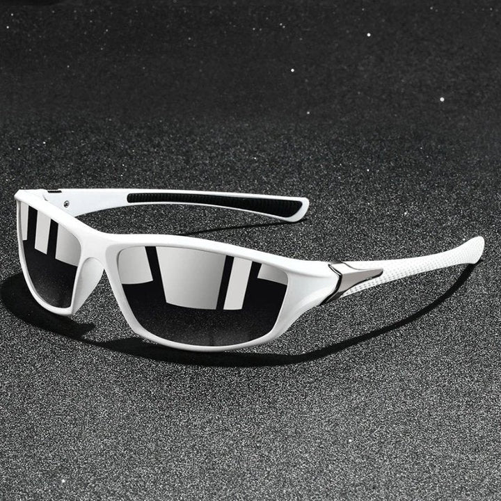 Performance men's wraparound sport shades. Polarized lenses reduce glare, offering superior vision & UV protection.