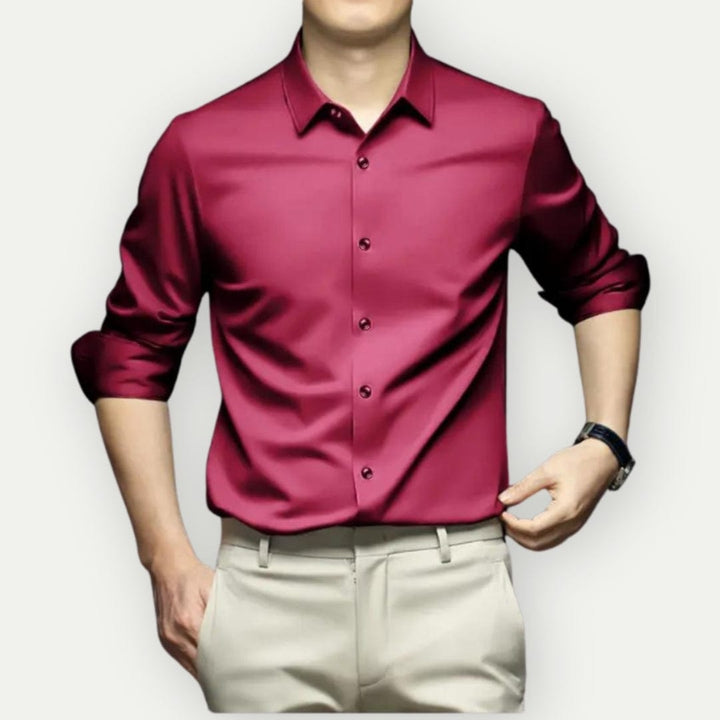Wrinkle-free men's dress shirt, slim fit and long sleeve. Provides a polished look with minimal effort.