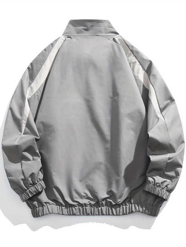 Modern men's outerwear: a versatile zip-front windbreaker jacket with a stand collar for cool weather.