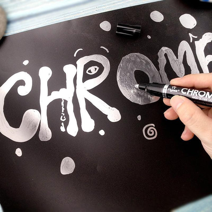 Close-up of a Metallic Liquid Mirror Chrome Marker, showing its premium nib for reflective art.
