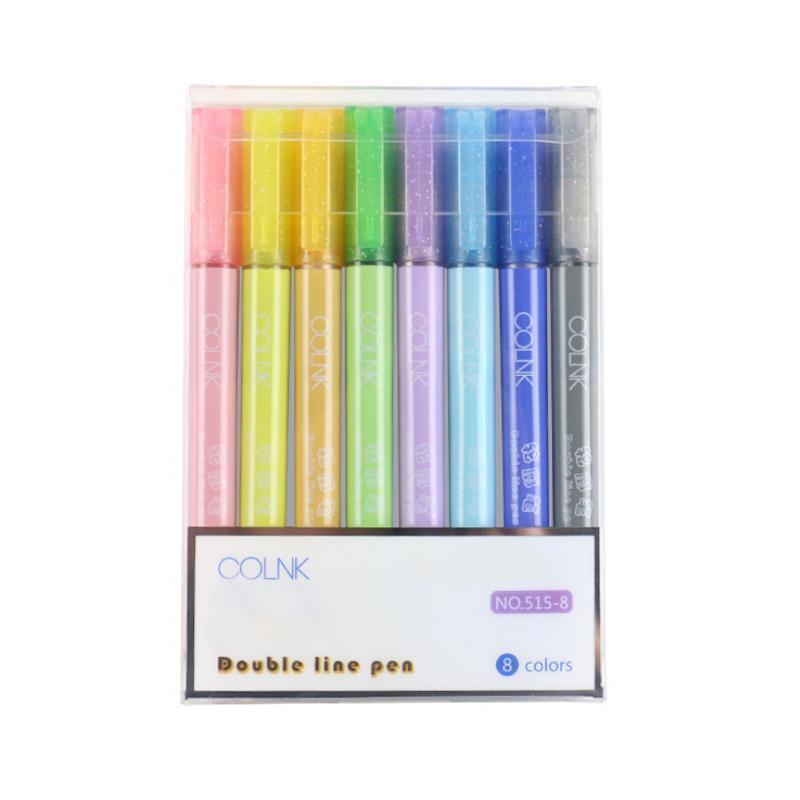 Hand holding a Metallic Outline Art Marker Pen, showcasing its fine tip for detailed work.