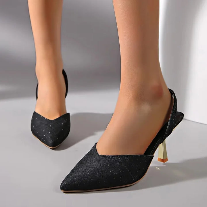 Stylish women's metallic orthopedic slingback heels with a comfortable pointed toe design