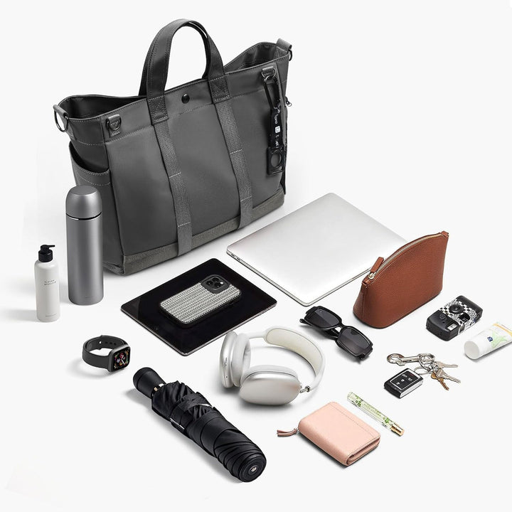 Stylish MetroCarry laptop tote bag, unisex design with multiple compartments & adjustable shoulder strap.