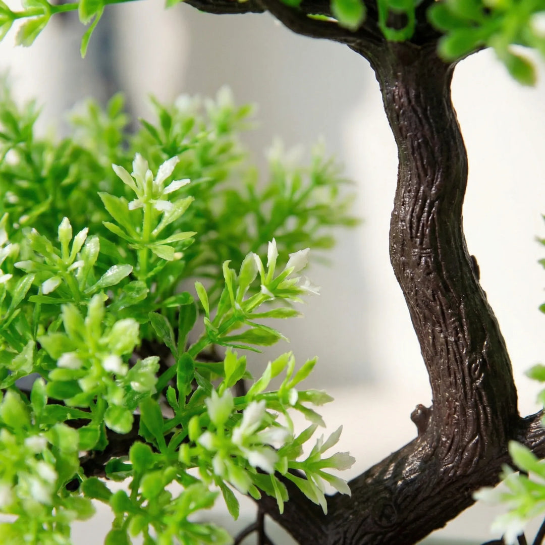Lifelike mini sculpted tree, a beautiful faux plant for indoor home decor.