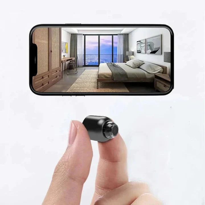 Mini wireless home security camera with night vision, motion detection, and remote monitoring features.
