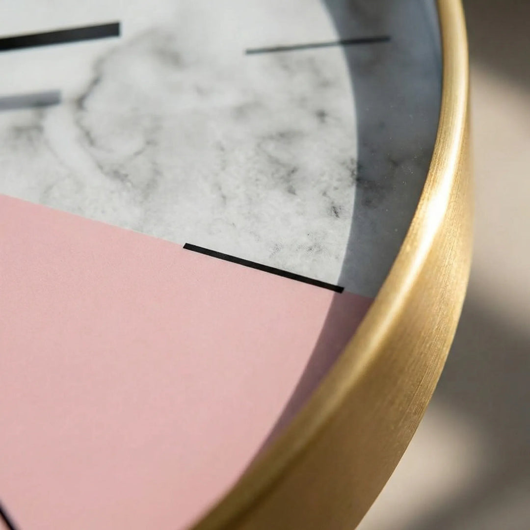 Modern round wall clock with minimalist design. Enhances any living room, bedroom, or office decor.