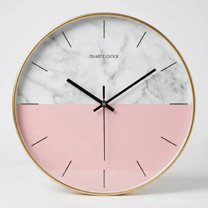 Chic minimalist round wall clock. Adds a touch of modern design to any bedroom or living room decor.