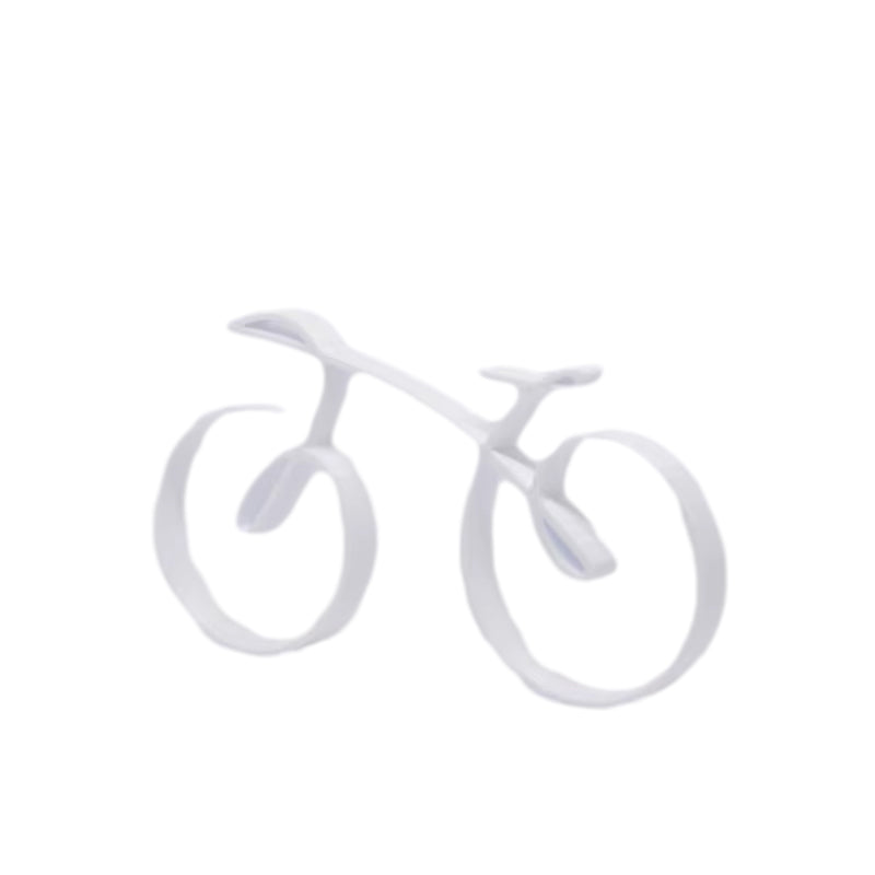 Minimalist bicycle sculpture displayed on a shelf, adding a touch of wireframe metal art decor