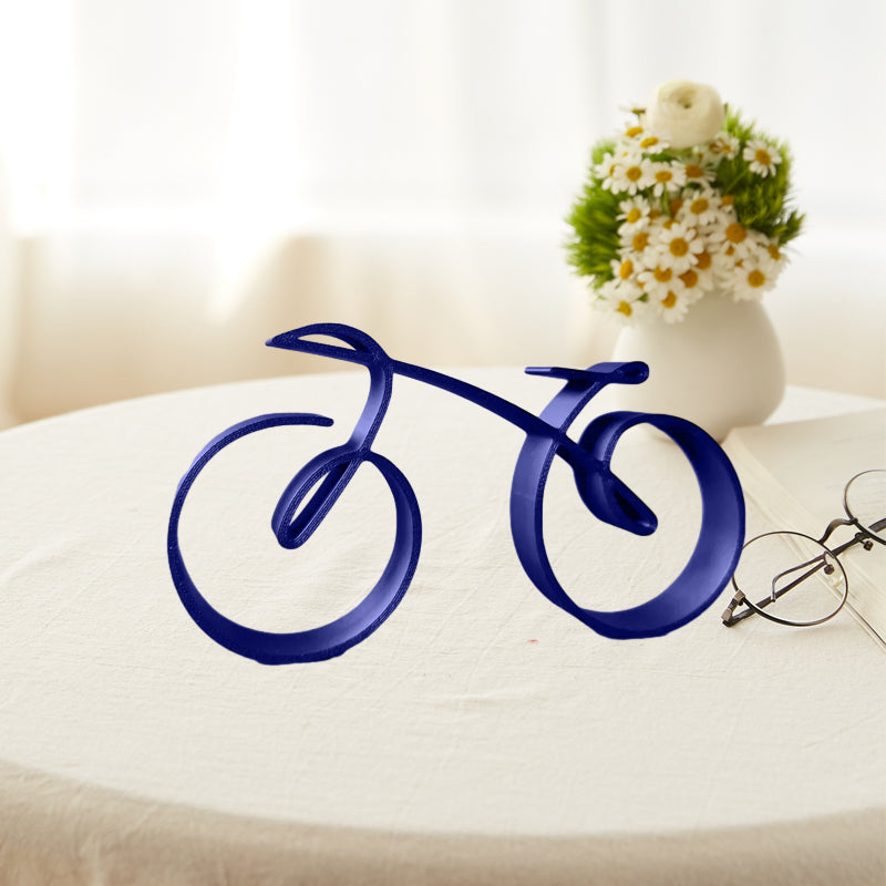 Detailed shot of joins on minimalist bicycle sculpture, showcasing quality metal art and form