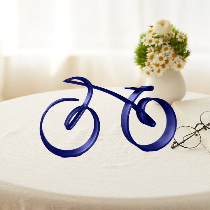 Detailed shot of joins on minimalist bicycle sculpture, showcasing quality metal art and form