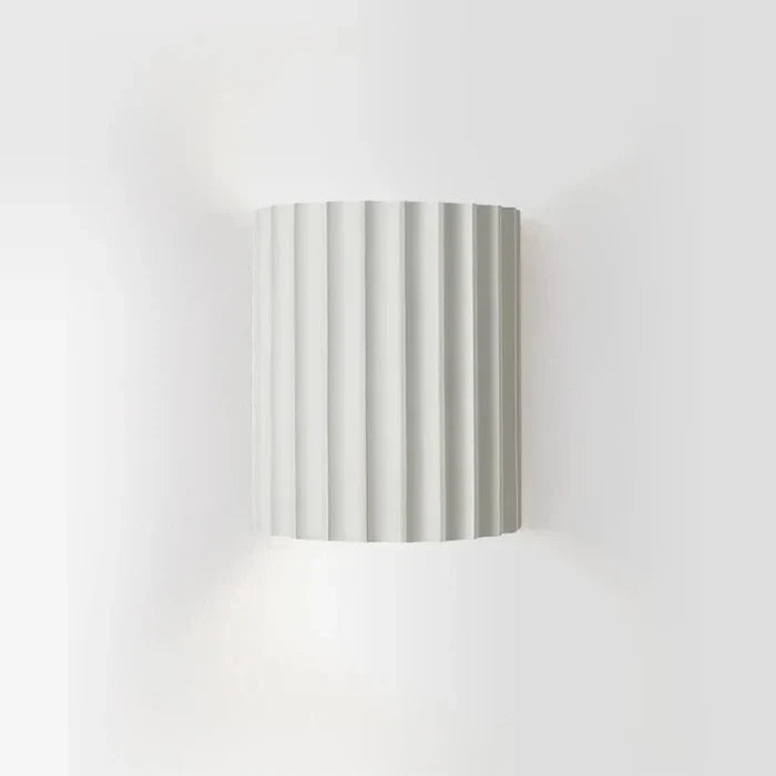 Modern artistic LED wall sconce, a contemporary lighting fixture perfect for home decor & interior spaces.
