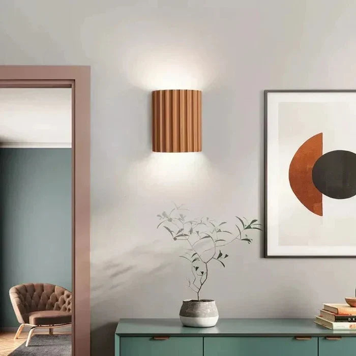 Contemporary LED wall sconce, a decorative lighting design fixture enhancing modern home decor and ambiance.