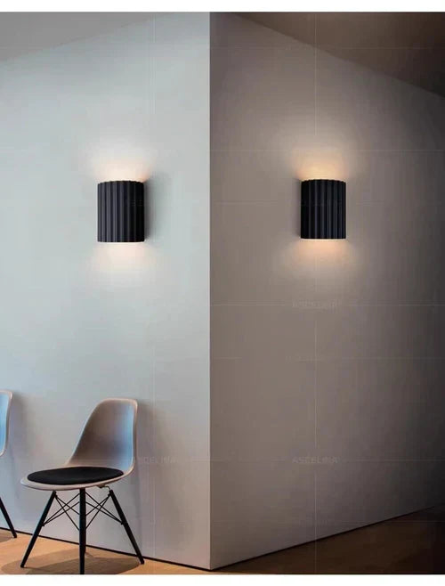 Artistic wall sconce light for modern interior design, a sleek decorative lamp perfect for home accent lighting.