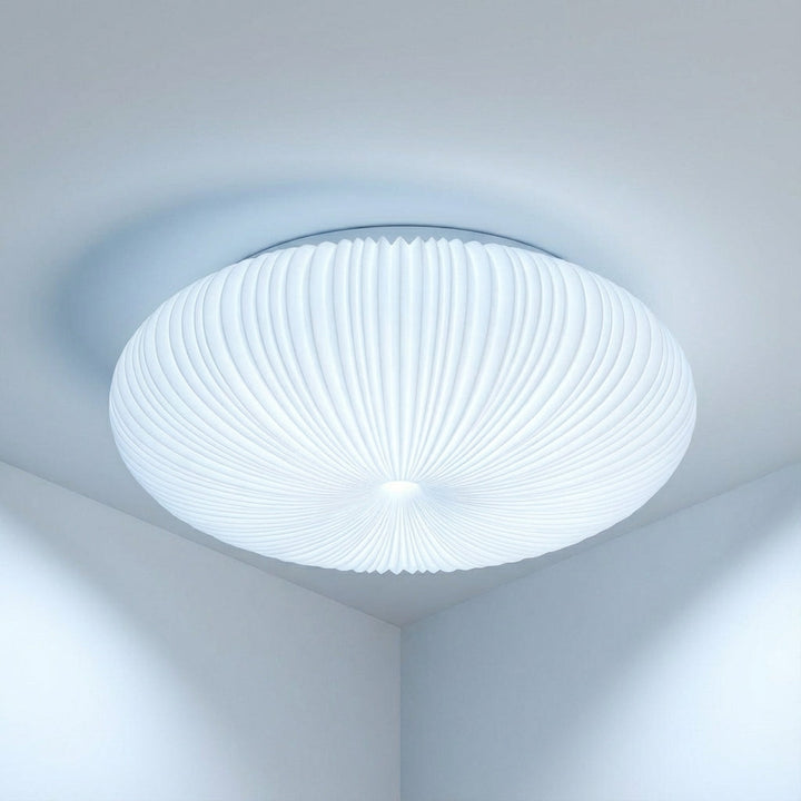 Dimmable LED modern flush mount ceiling light providing energy-efficient, gentle ambient glow for contemporary homes.