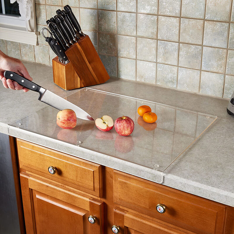 Acrylic non-slip cutting board for efficient & safe food preparation. A modern kitchen accessory for home chefs.