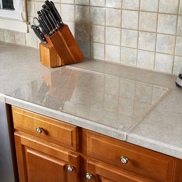 Versatile clear acrylic non-slip cutting board for all kitchen tasks: chopping, slicing, and serving. Durable.
