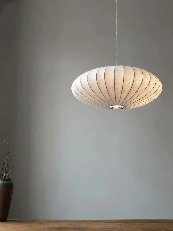 Elegant silk and crystal ceiling lamp, a luxury home decor piece for contemporary spaces.